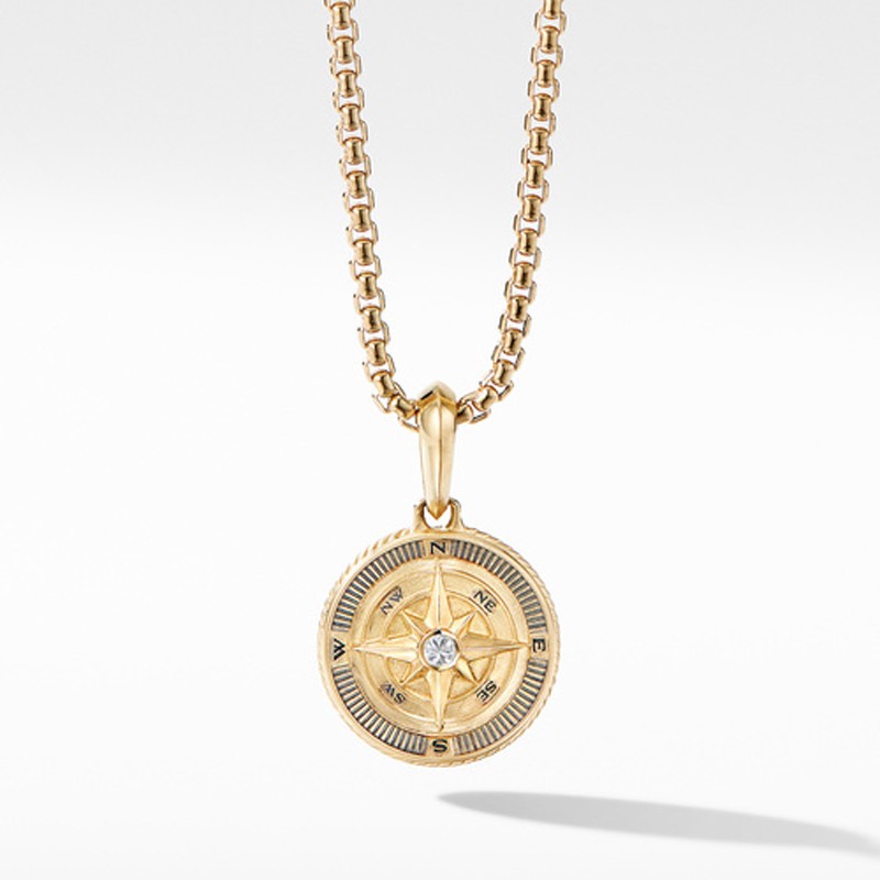 COMPASS AMULET IN 18K YELLOW GOLD WITH CENTER DIAMOND